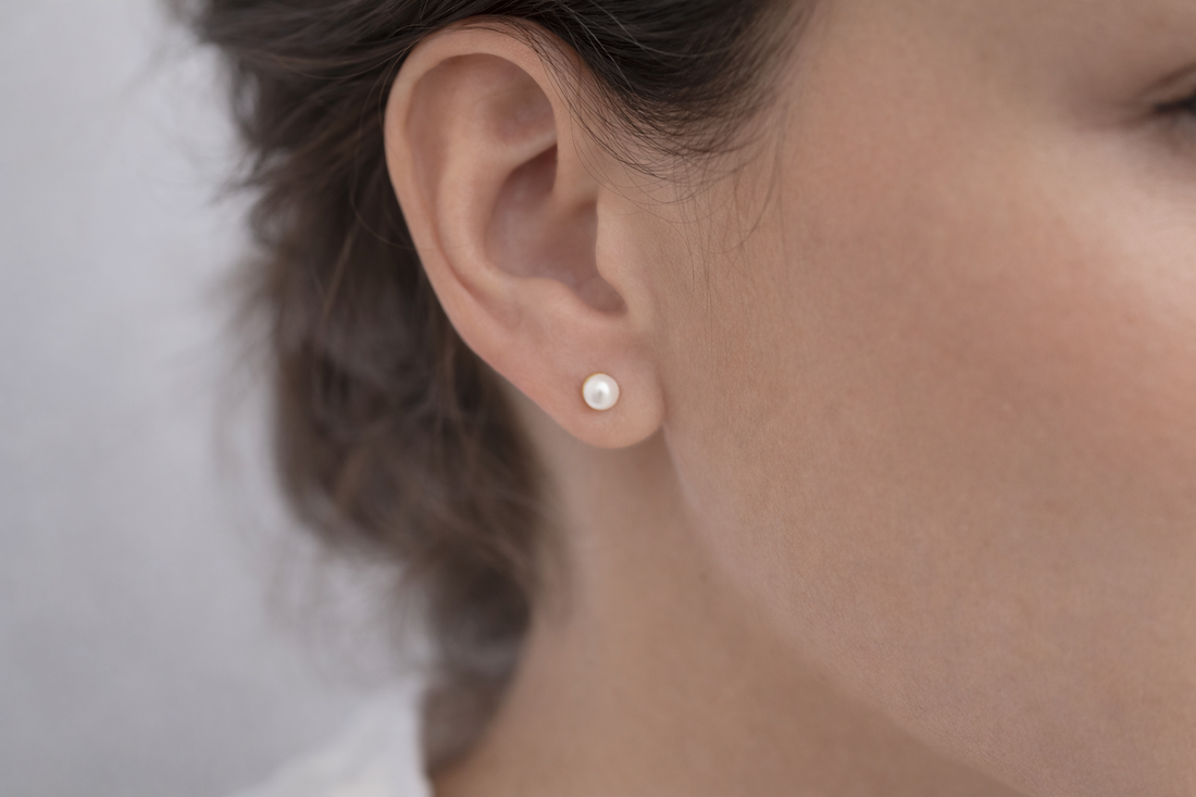 The Classic Aura: Timeless Pearl Studs