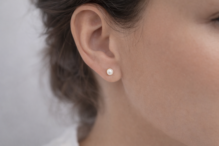 The Classic Aura: Timeless Pearl Studs
