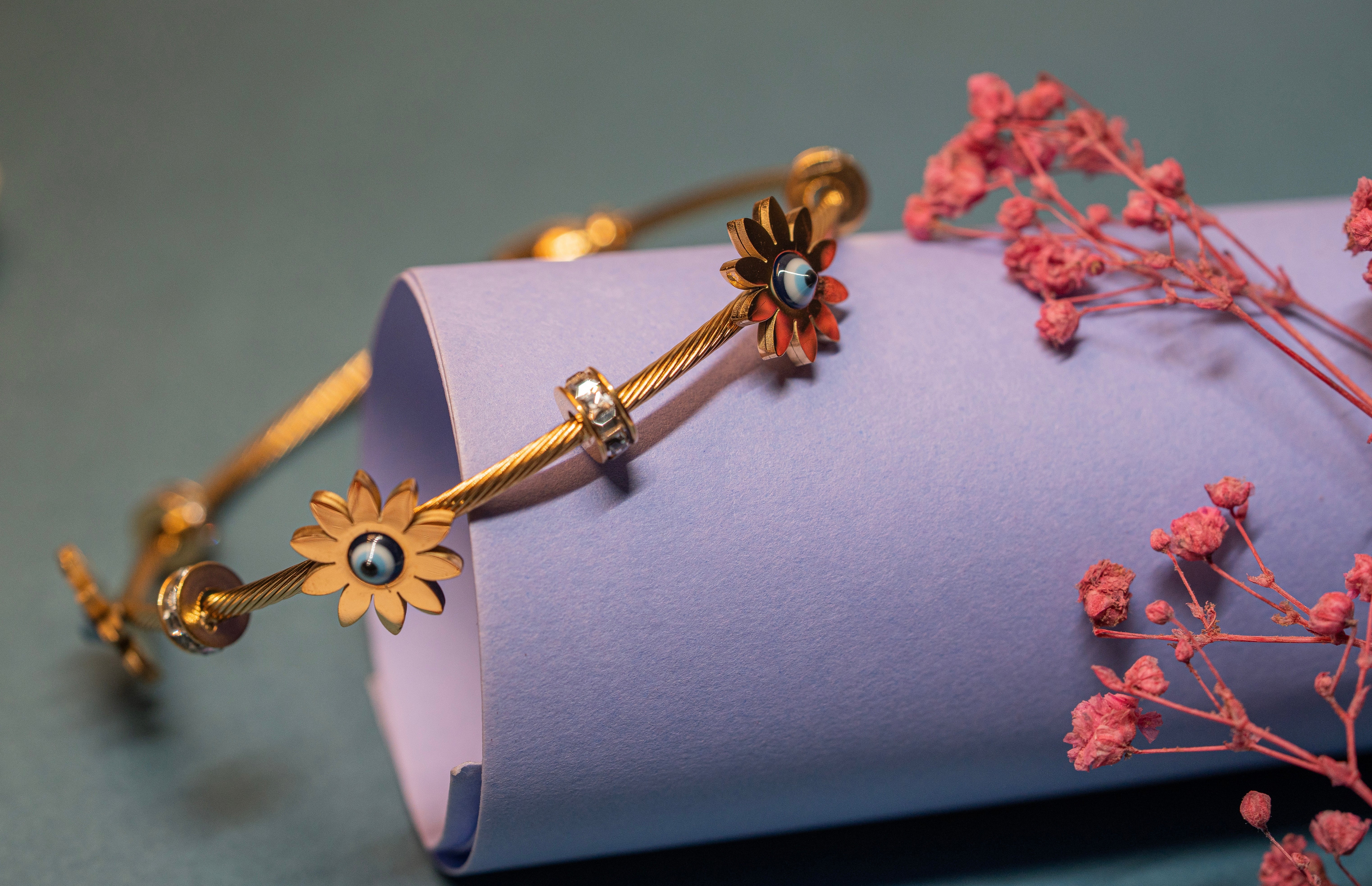 Evil Eye and Flower Charm Bracelet.