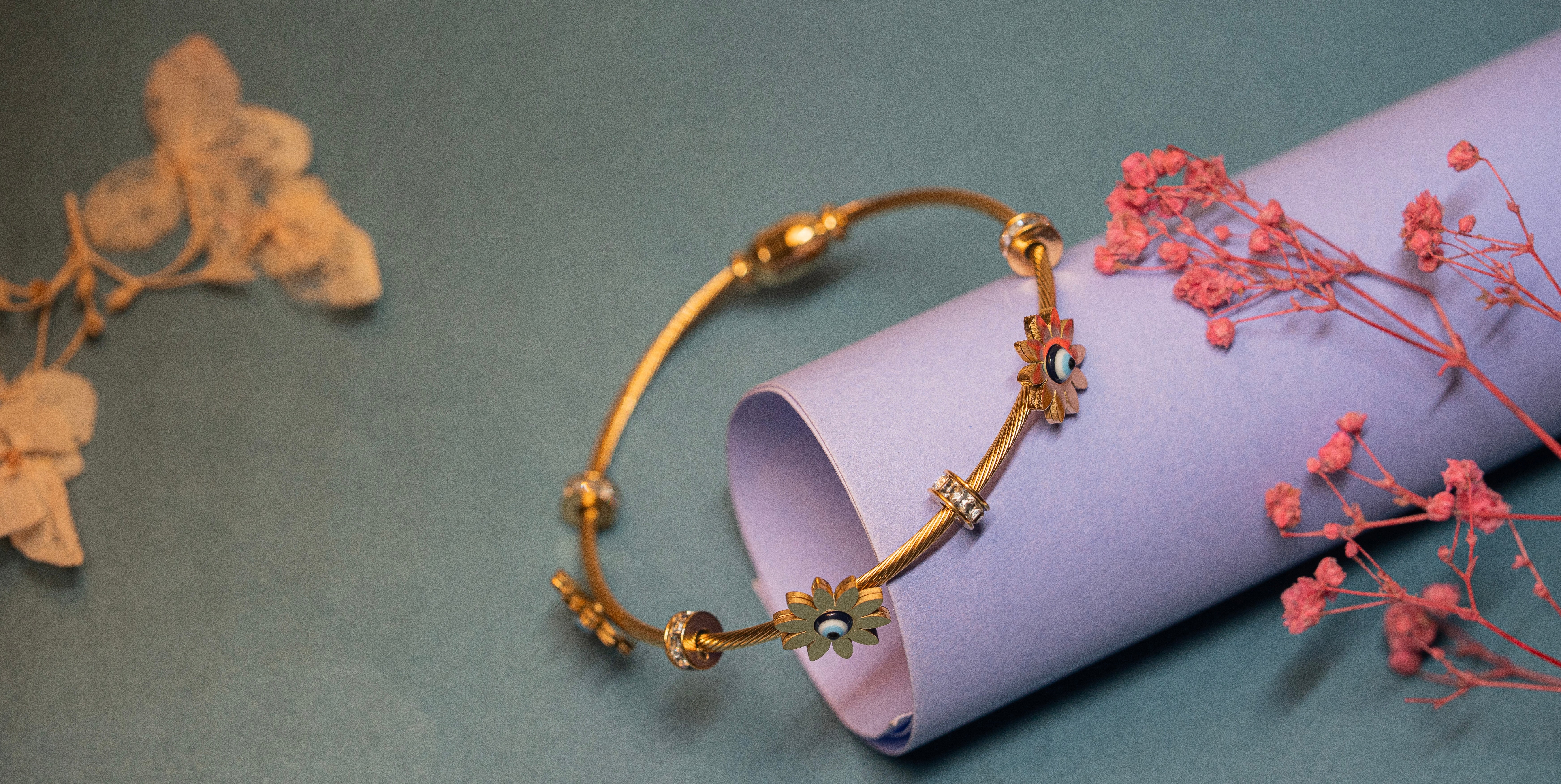 Evil Eye and Flower Charm Bracelet.
