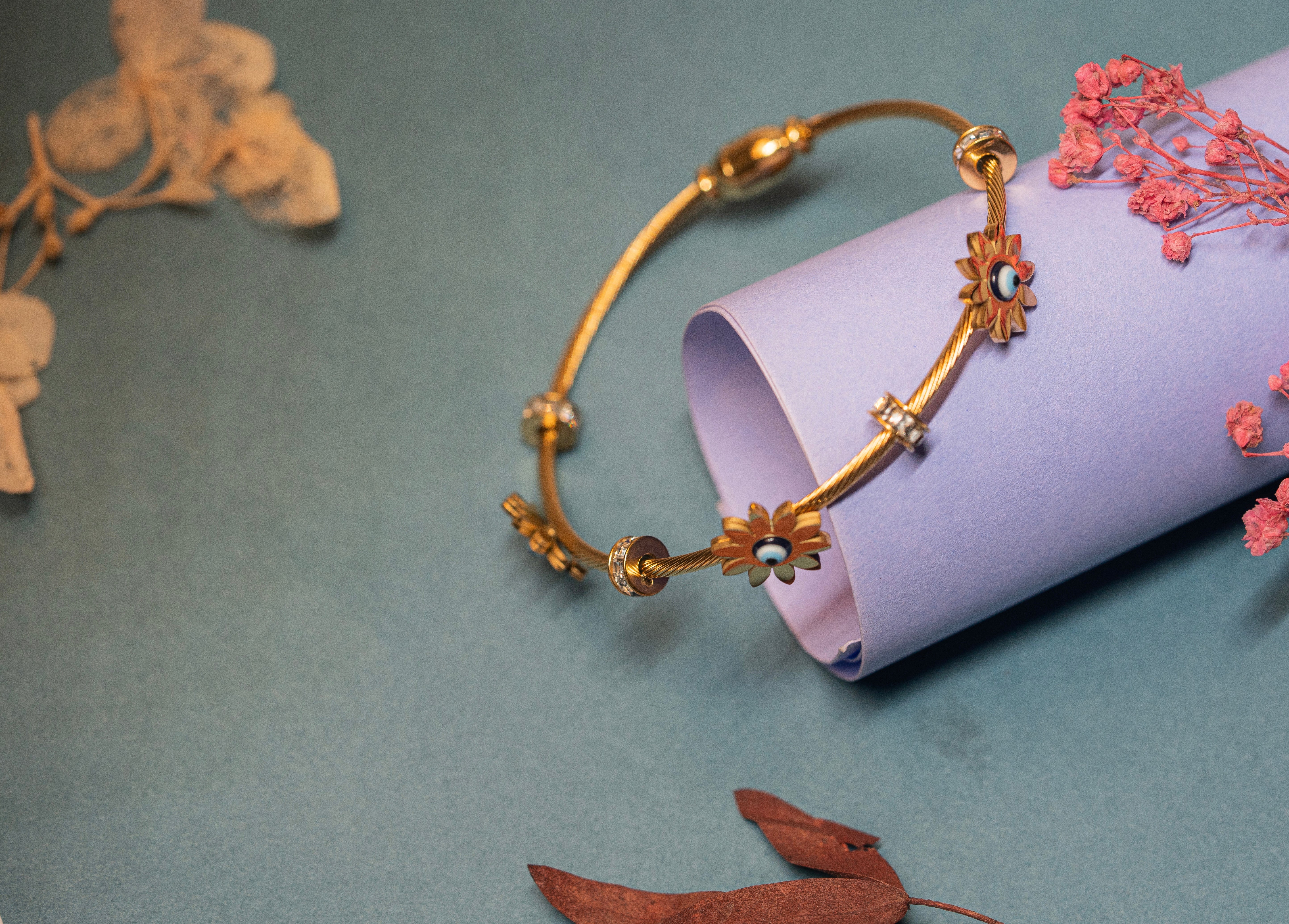 Evil Eye and Flower Charm Bracelet.