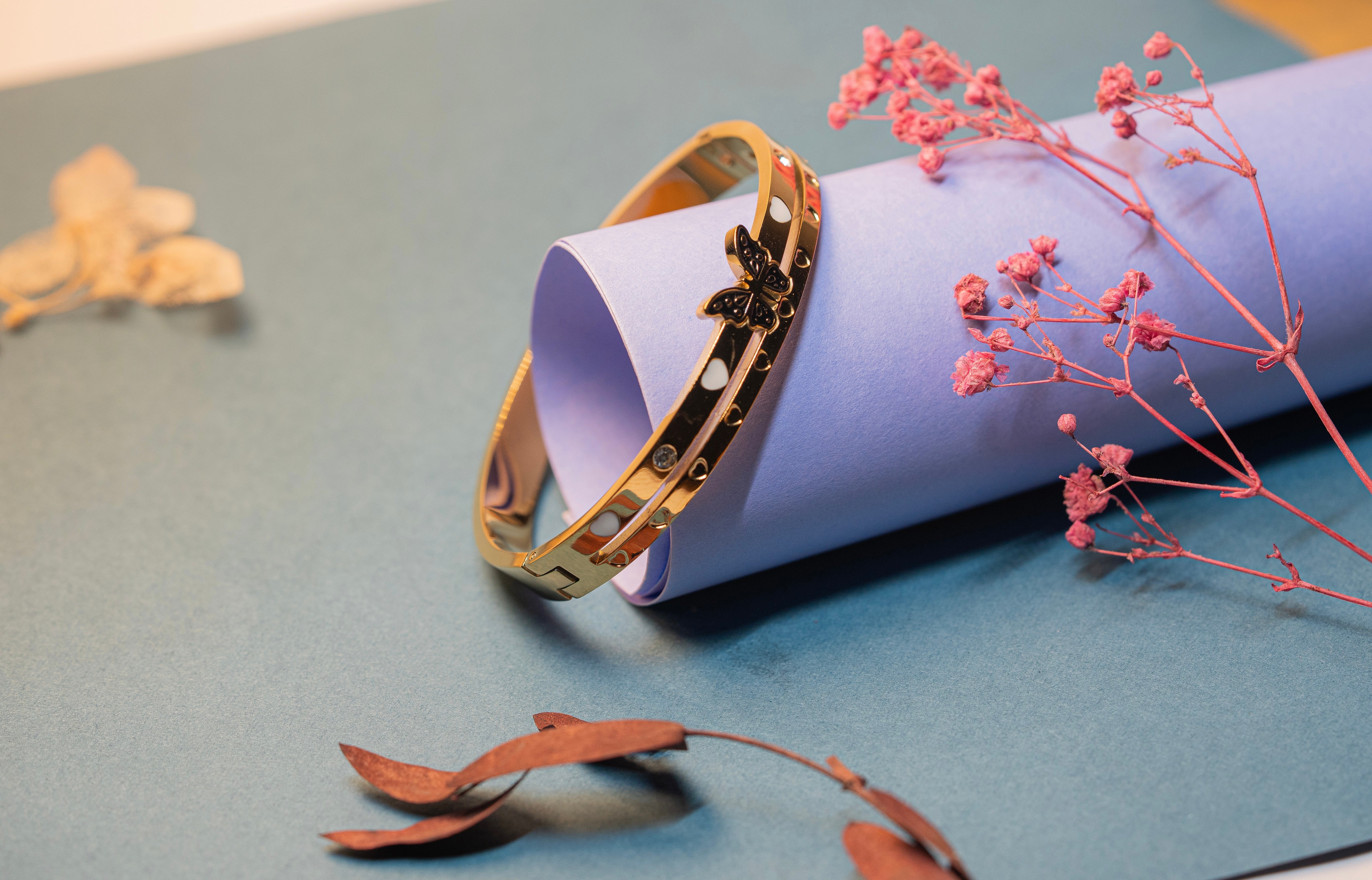 Gold Butterfly and Heart Bracelet.