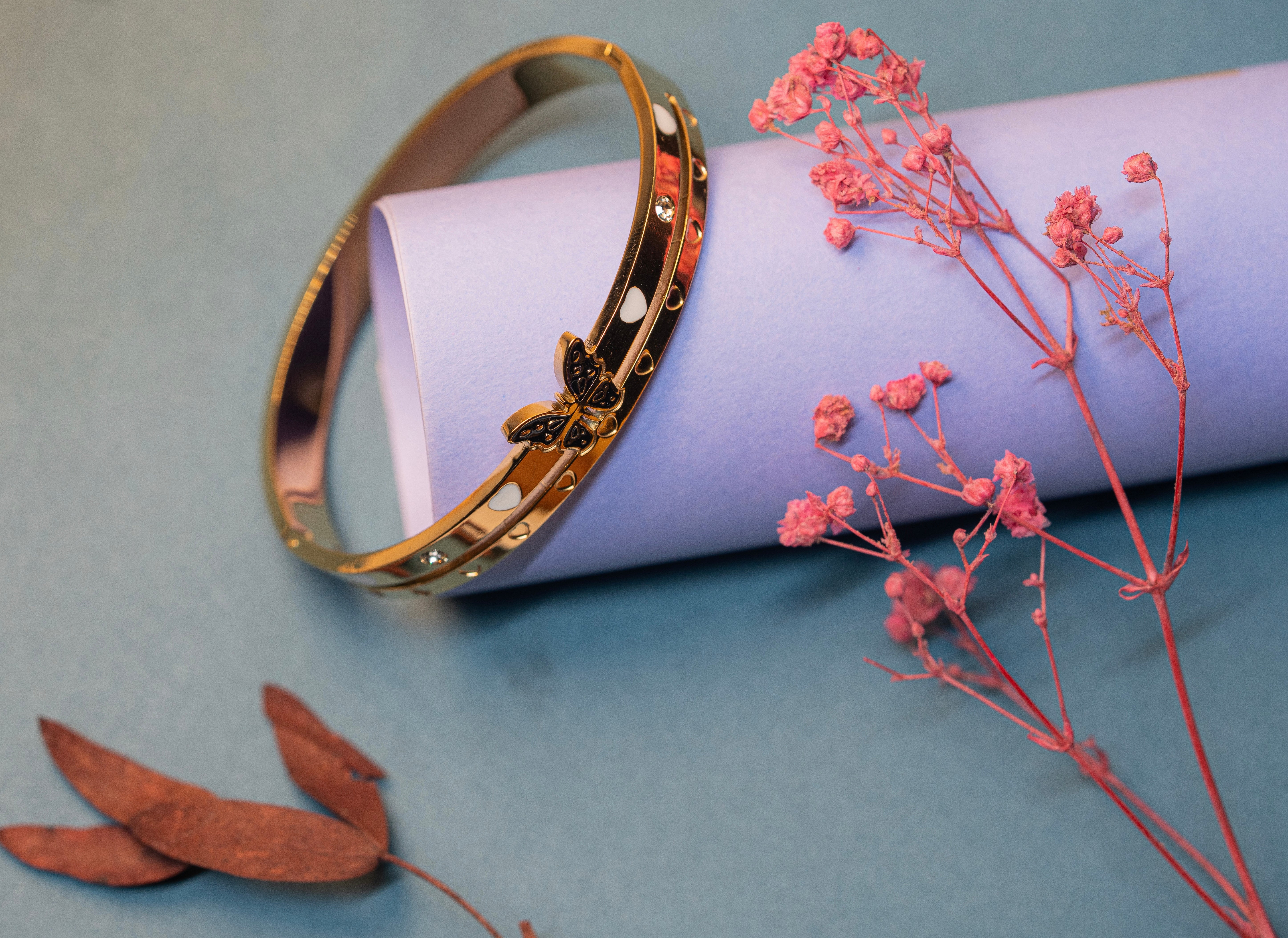 Gold Butterfly and Heart Bracelet.