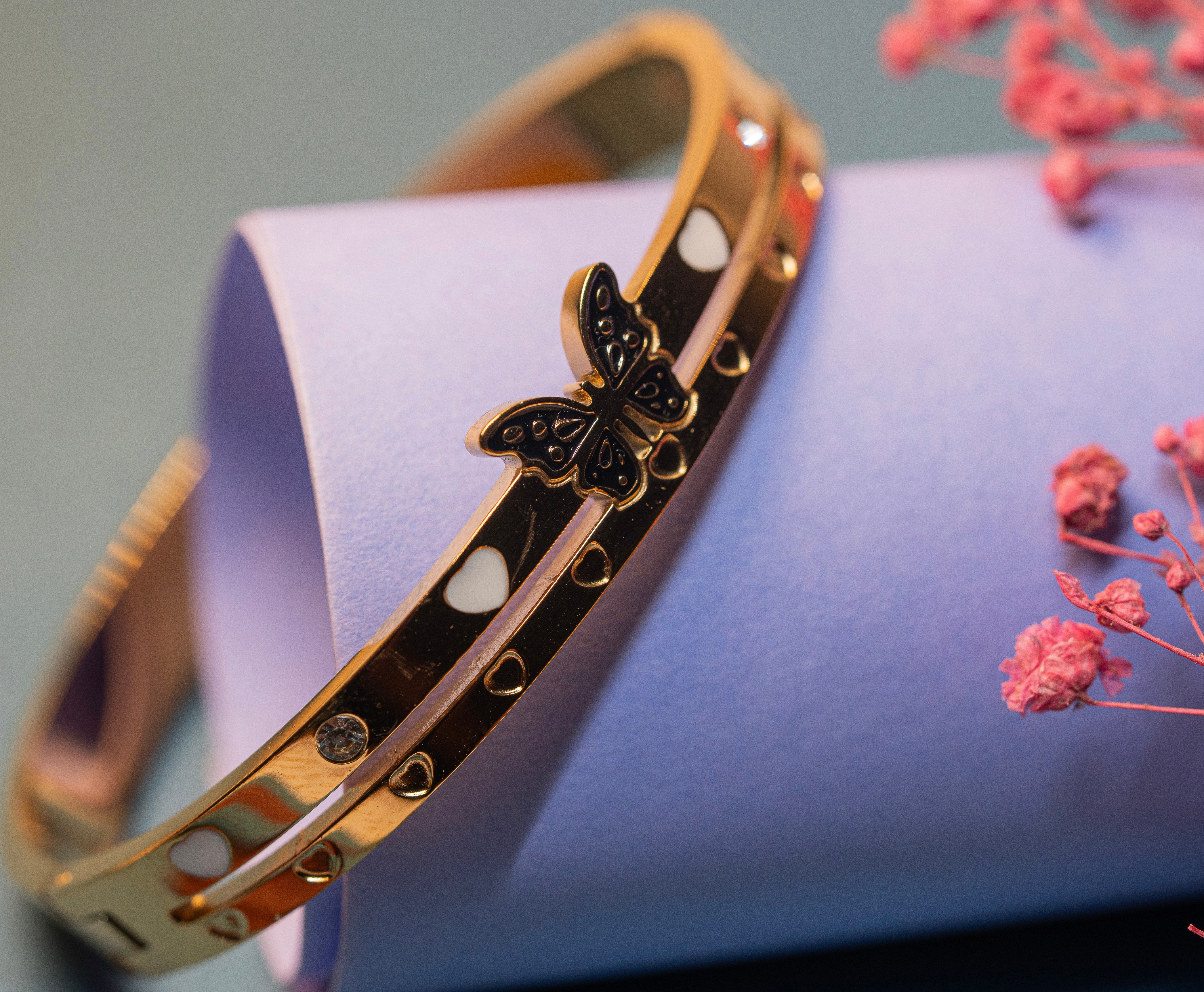 Gold Butterfly and Heart Bracelet.