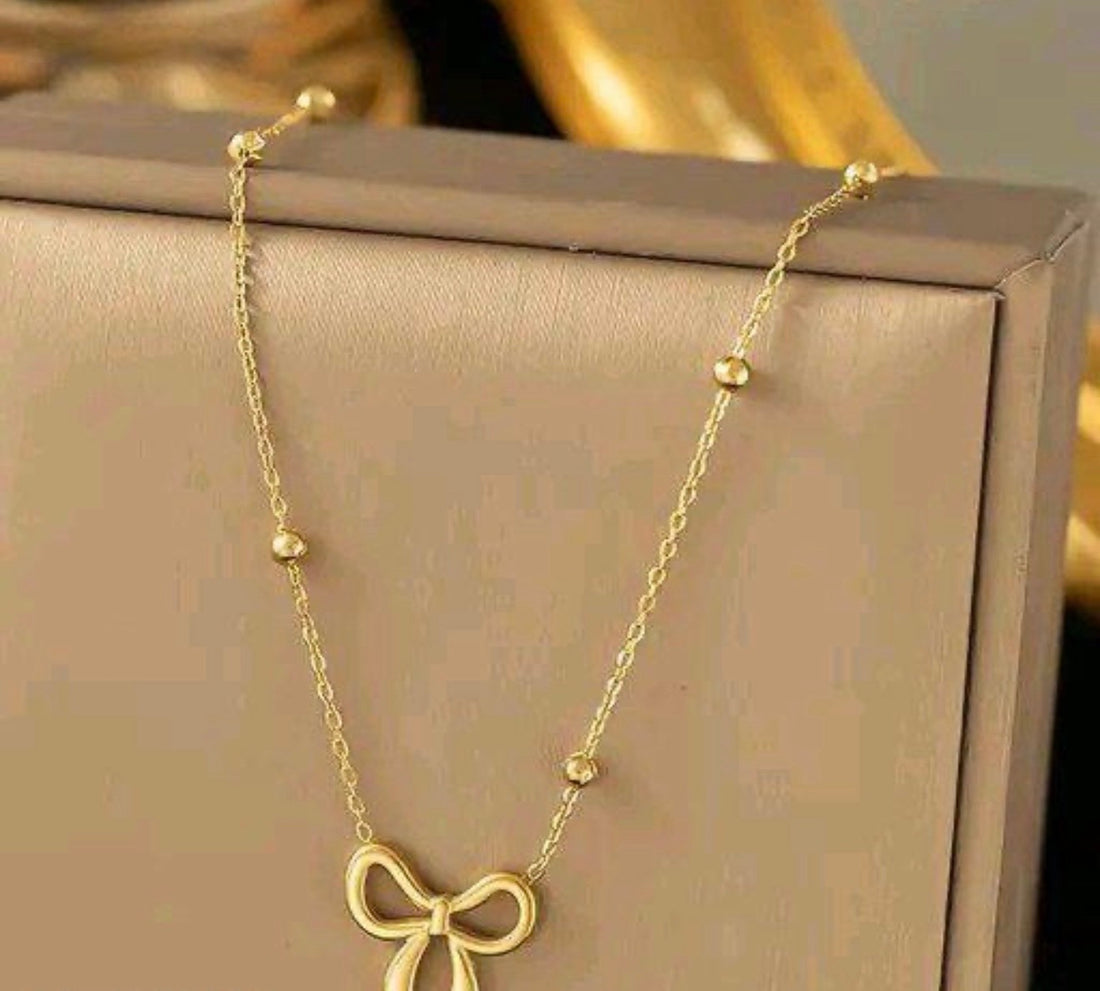 Beaded Bow Pendant Necklace