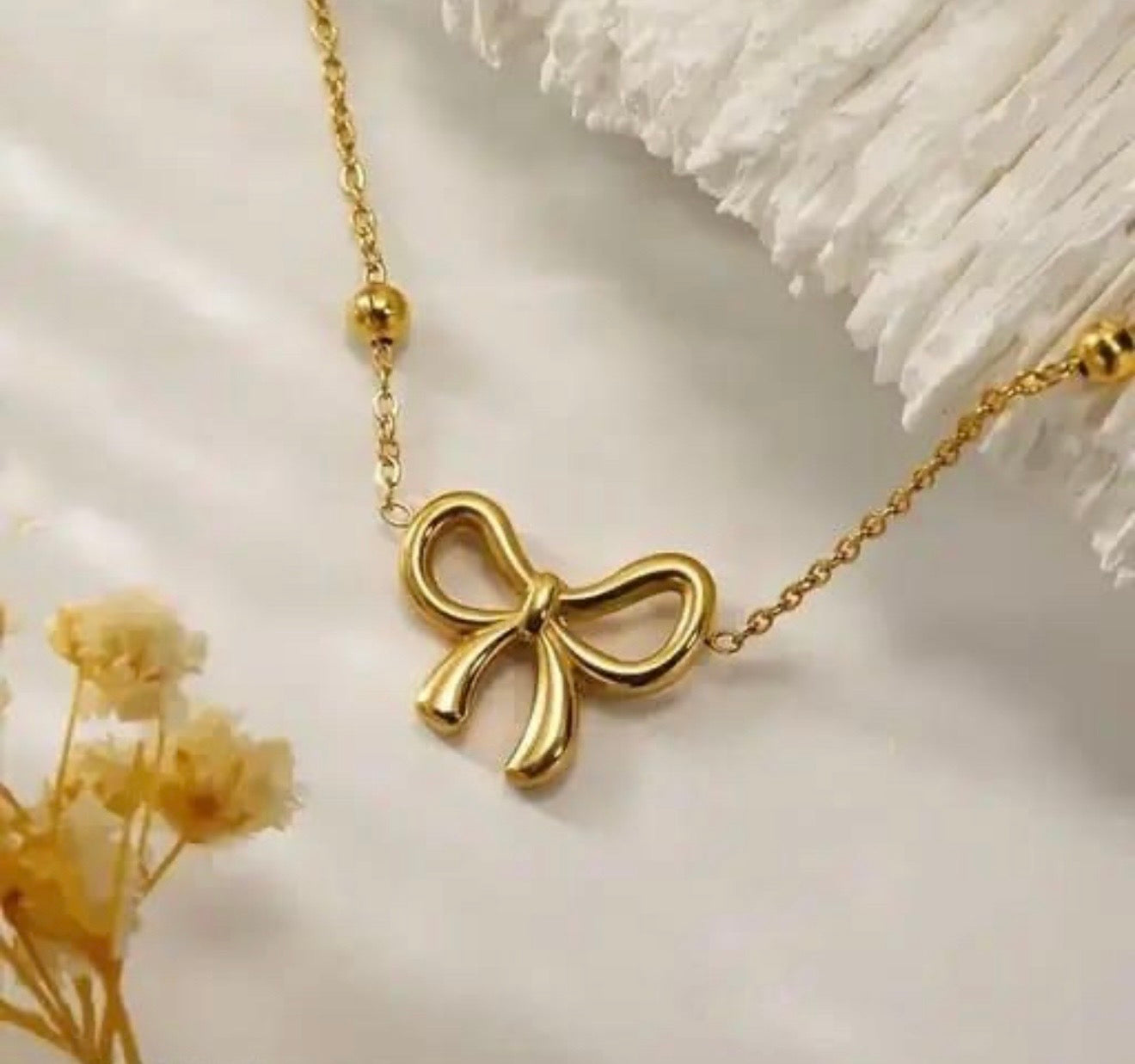 Beaded Bow Pendant Necklace