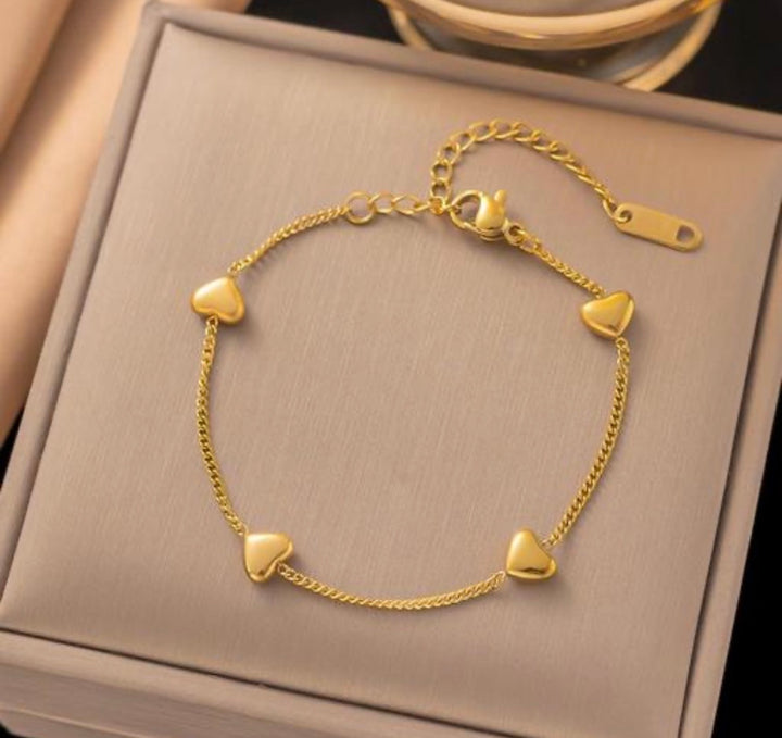 Gold Heart Charm Station Bracelet.