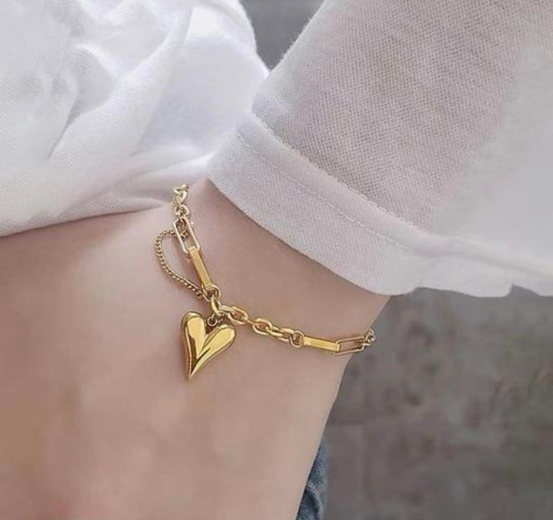 Mixed-Link Heart Charm Bracelet.