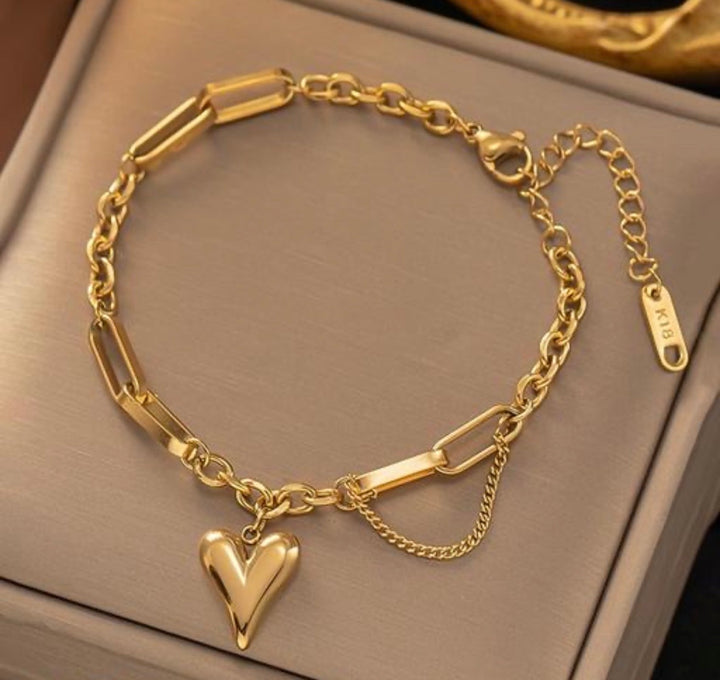 Mixed-Link Heart Charm Bracelet.