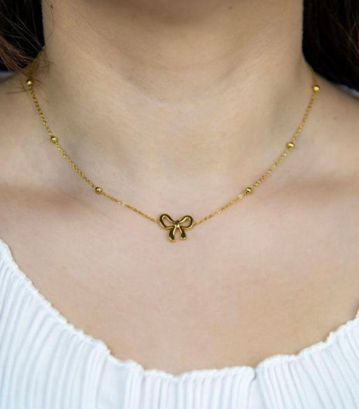 Beaded Bow Pendant Necklace