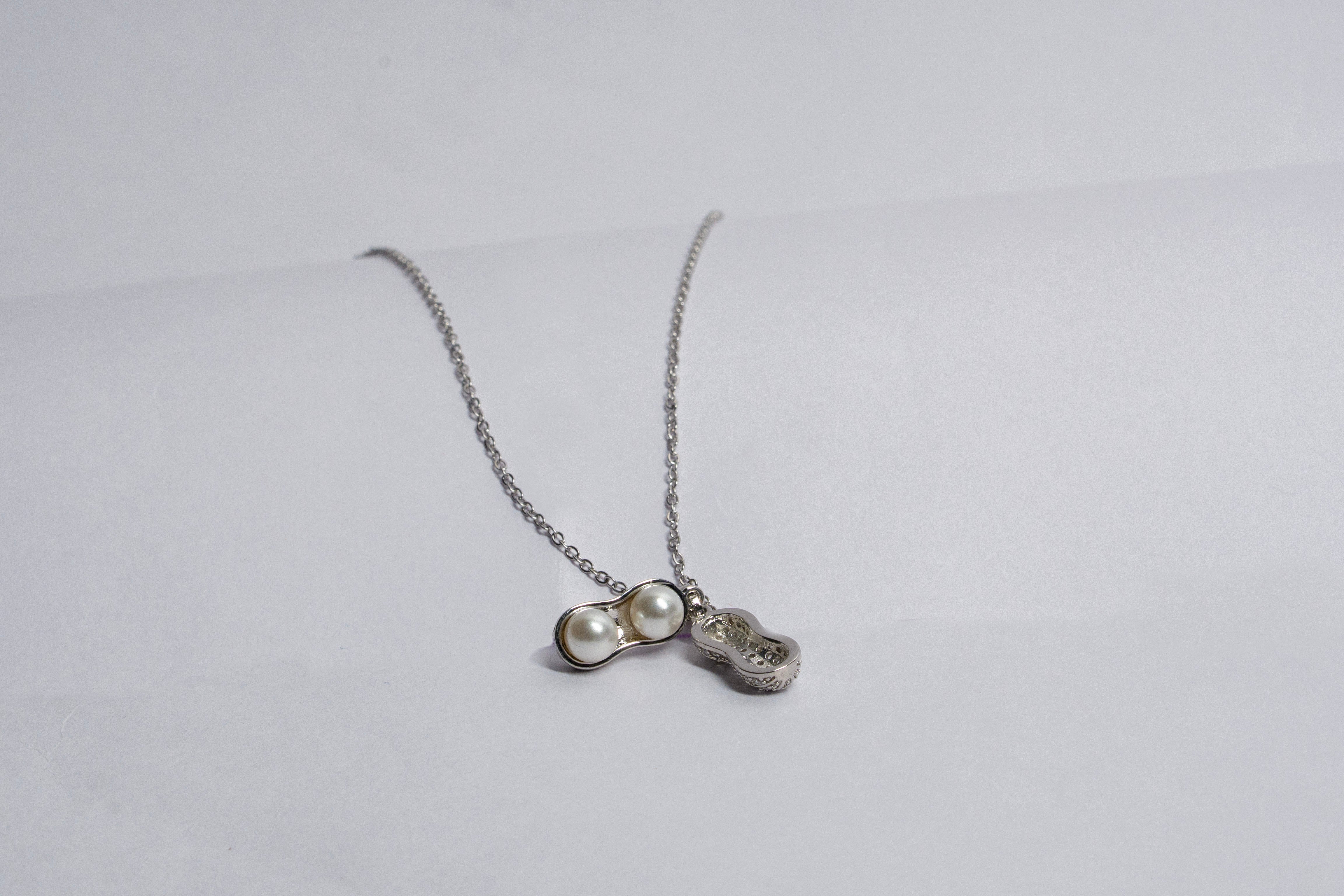 Twin Pearl Embrace Necklace