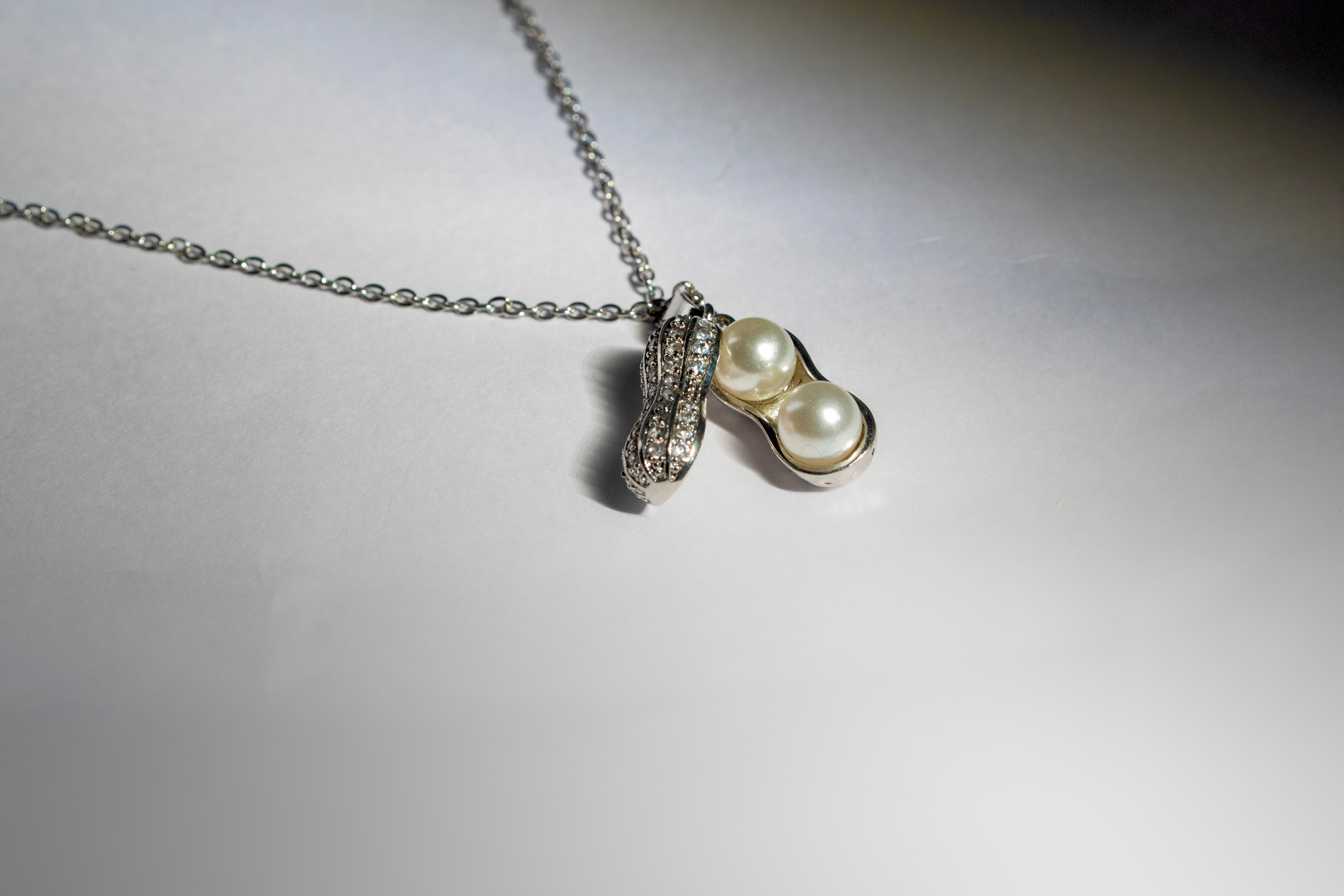 Twin Pearl Embrace Necklace